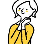 両手を合わせてご機嫌な表情の女性